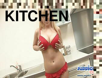 Jessica Cute, wearing bra and thong, fingers her twat in the kitchen