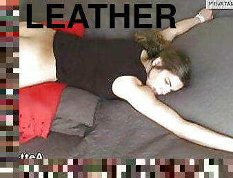 Julia in leather spanking