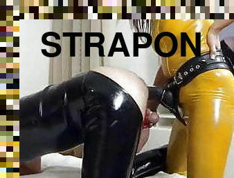 Latex strapon pegging