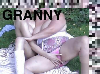 Sexy granny enjoying lesbian sex in outdoors