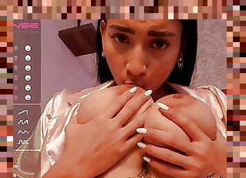 Exotic busty Letizia sucks her nipples on cam