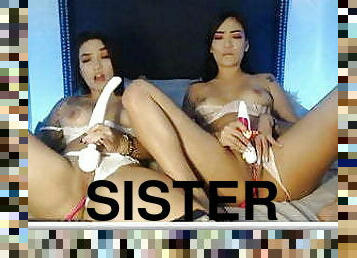 Two Sisters masturbate with vibrators