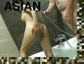 Alluring Asian beauty takes a shower after getting bonked hardcore