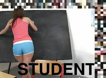 Naughty student slut fingers her cunt on teacher's desk