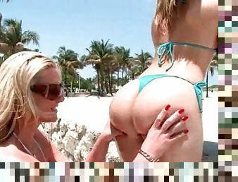 Huge ass trashy blondes flashing sexy parts at the beach