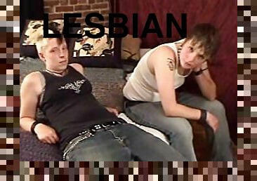 Tattooed lesbians with short hair enjoy fucking using strap on in retro clip