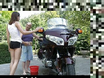 A much older guy gets to bang a teen slut by his motorcycle