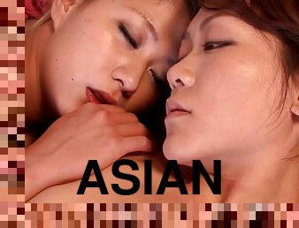 Fit Asian babes have some hot lesbian sex on their bed