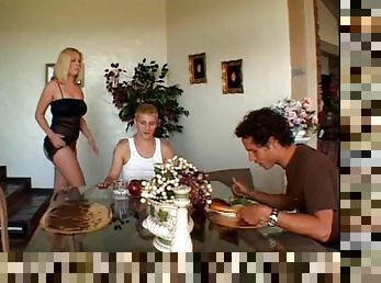 A dinner party ends with two guys double penetrating a hot chick