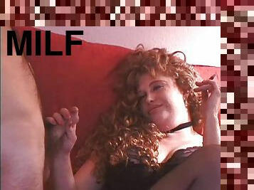 Curly-haired redhead called Flame sucks a prick in POV clip