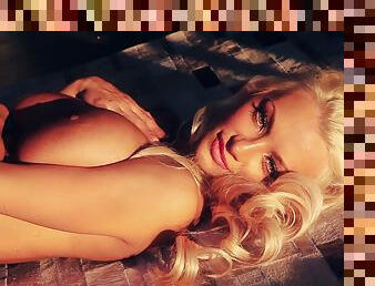 Lindsey Pelas boasts of her big tits at a photo shoot for Playboy