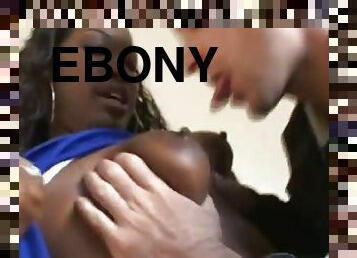Ebony cheerleader rides a cock in an interracial video