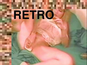 Lovely blonde girl stuffs her ass with sex toys in retro vid