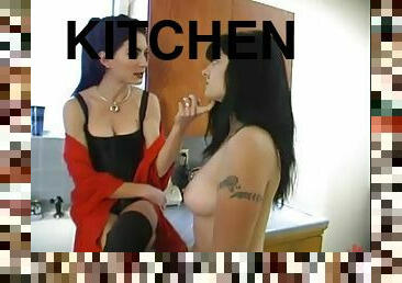 Carly gets tied up and dominated by Rebecca Lord in a kitchen