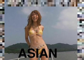 Sizzling Asuka Hoshino sucks a guy off on a boat