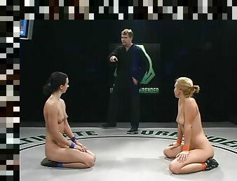 Two deliciously hot chicks are wrestling naked