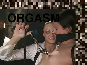 Nasty brunette gets her cunt toyed to orgasm in BDSM clip
