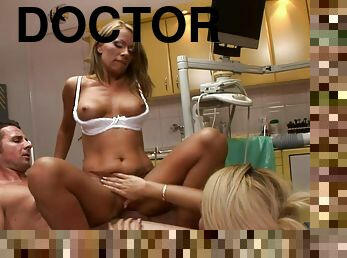 Two sexy blondes share a doctor's prick in his office