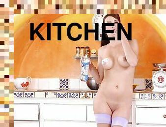 Erika Knight the pretty brownie poses naked in a kitchen