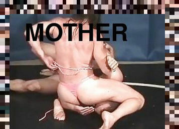 CatFight mixed wrestling female bodybuilder vs male bodybuilder with scissors, chokes, schoolg
