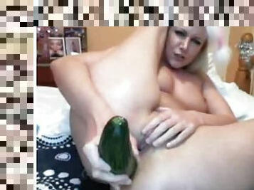 Webcam session blonde uses cucumber
