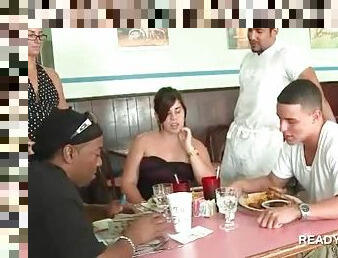 Teen couple playing sex games for cash in a restaurant