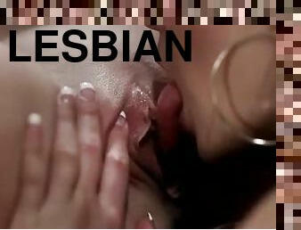 Ashleigh Embers and Sasha in close up lesbian video