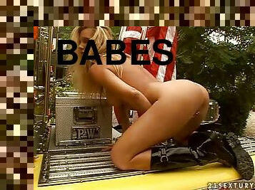 Sandy the horny blonde masturbates in the truck