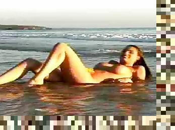 Merritt Cabal poses for the cam on the shore of a sea
