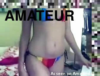 Webcam teen takes her bikini off