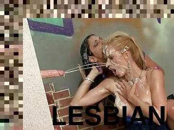 Lesbo Lovers Get Wet and Messy Thanks to a Gloryhole Cock