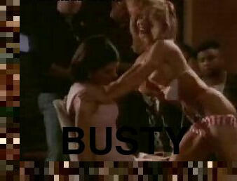 Busty Jennifer Wolf Gives Elizabeth Wagner a Hot Topless Lap Dance