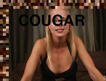 Tattooed blonde cougar with a pierced pussy sucking a stranger's cock