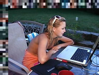 Blonde slut chatting on the computer while her tits are out