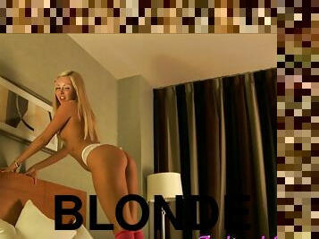 Hot solo blonde in socks and sexy thong showing her small tits