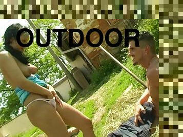 She gets her anal streched doggystyle in an outdoors scene