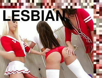 Lesbians in uniform drill their assholes using a strap on in the locker room