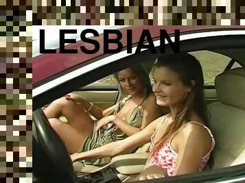 Vivacious lesbian couple enjoys pussy licking in the car