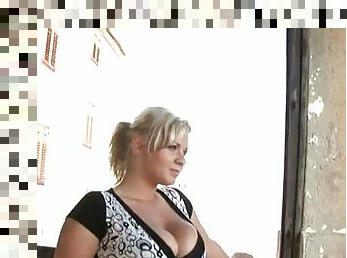 Curvy blonde Malina May shows her massive tits and masturbates