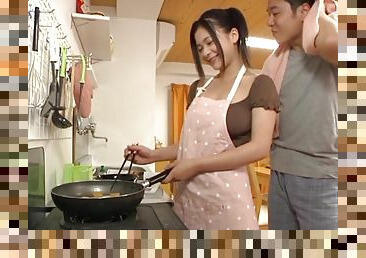 A Japanese housewife gives a blowjob to her lucky hubby