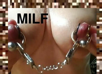 nippleringlover putting mini handcuffs on extreme large gauge nipple piercings and plays with them