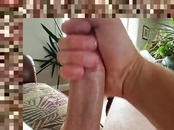 Jerking that big hard cock until it spits