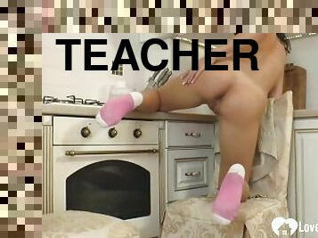 Beautiful teacher strips and spreads her legs