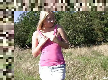 Teen makes sure she is alone before masturbating outdoors