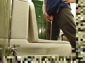 Public toilet pissing, bottom view