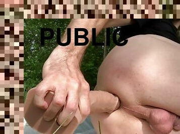 Riding huge anal dildo in public: prostate milking in the woods