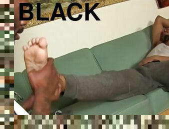 Black stud receives foot licking and worship from his buddy