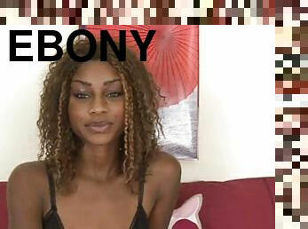 Admirable curly-haired ebony Honie masturbates her pussy indoors
