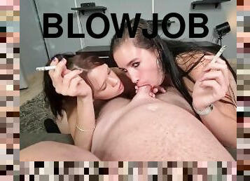 Two smoking sluts sucking one lucky guy's cock  POV