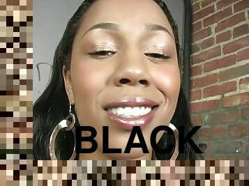 Stunning Black girl gives a blowjob in gloryhole show